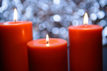 aromatic orange candle, bokeh background