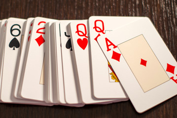 Deck of playing card spread out on a table