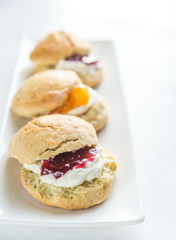 Scones with cream and fruit jam