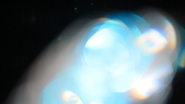 The video futage lens bokeh, glitter, glare overlay. Celebration, festive, cheerful, gala. Use blending modes, screen mode in the video editing program.    