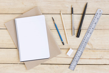 Stationery and Drawing equipment. on wood background