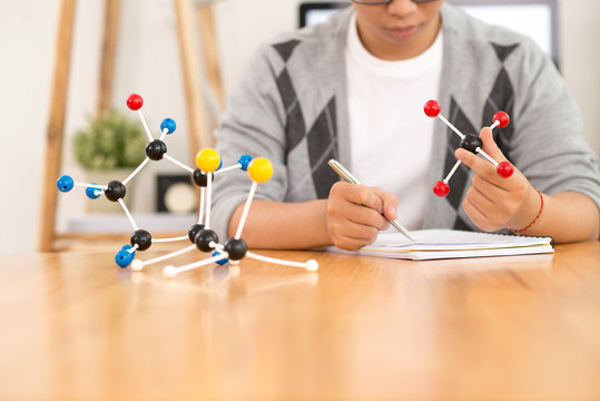 Examining molecular models - Powered by Adobe