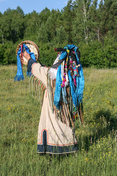 shaman performs a ritual