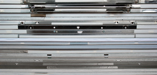 Many old lcd screens. Stack of tft panels from monitors and laptops, side view