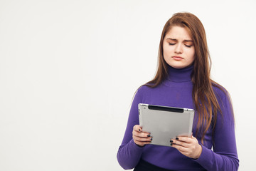 Fototapeta premium Teen with tablet pc, white background