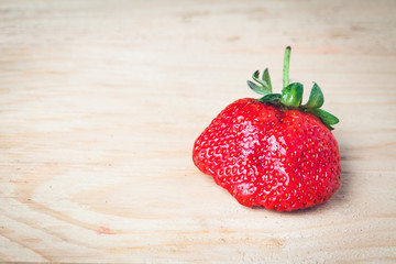 Fresh strawberry were placed on wood background