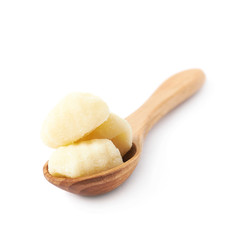 Spoon full of gnocchi isolated