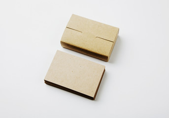 Stack of blank business cards and craft Cards box on white background