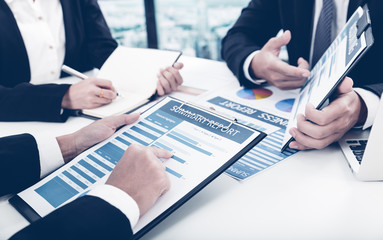 Business people discussing the charts and graphs showing the res