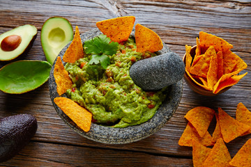 Guacamole with nachos in Mexican molcajete