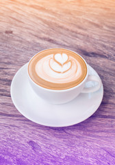 Hot late art on wooden backgroud pastel tone