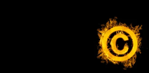 Crédence de cuisine en verre imprimé Flamme Composite image of copywrite logo in fire