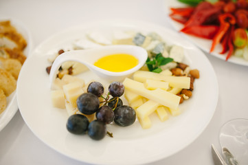 Plate of Cheese on white plate at a restaurant