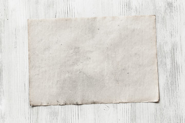 Fototapeta premium paper on wooden background