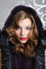 beautiful girl portrait in fur coat