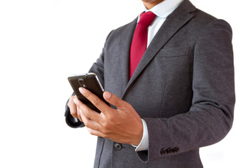 Businessman using mobile phone isolated white background