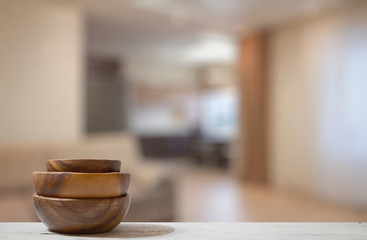 stack of empty wooden bowls on table