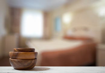 stack of empty wooden bowls on table