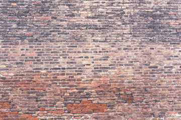 Destroyed brick wall in old vintage city, Venice.