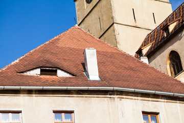 Roofs and architectural details in Sibiu, Romania. Special roof desigh with eyes
