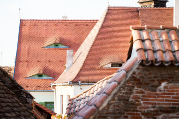 Roofs and architectural details in Sibiu, Romania. Special roof desigh with eyes