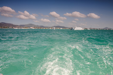Trail on water surface behind boat