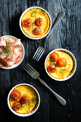 Omelette with cherry tomatoes and pancetta