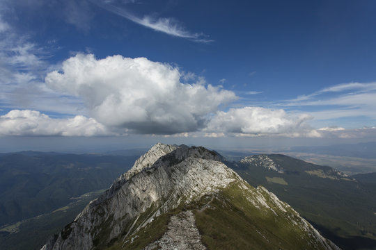Spring landscape and Piatra Craiului mountains in background,Tra