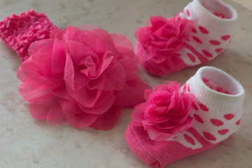 Baby socks with polka dots;  flower
