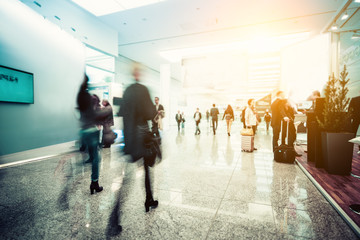 blurred people at a trade fair
