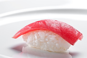 Sushi nigiri with tuna on a white background 