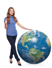 Woman in full length with earth globe