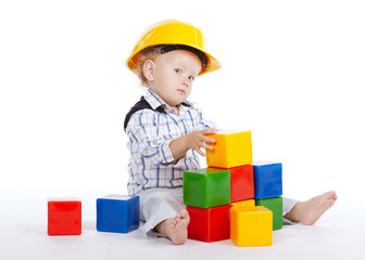 little engineer plays with cubes