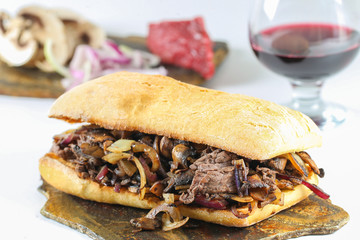 Tasty beef steak onion mushroom sandwich in a ciabatta 