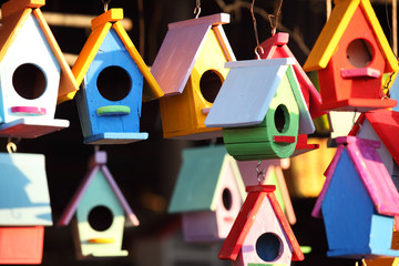 colorful wooden bird house - Powered by Adobe