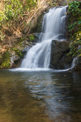 Fototapeta na wymiar Thor Thip waterfall in thai national park