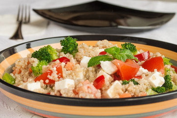 Healthy quinoa salad with mix of vegetables.