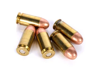 Gordijnen cartridges of .45 ACP pistols ammo. © boonchuay1970
