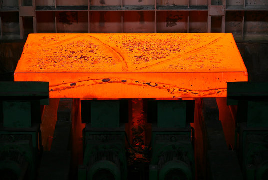 red-hot steel slab heated in the furnace
