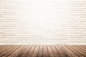 interior room with brick wall and wooden floor