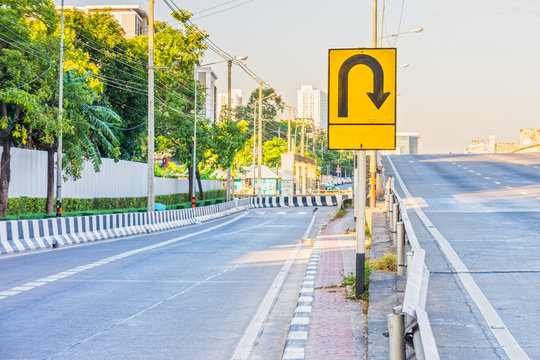 Warning U-Turn Traffic Sign. Traffic signs in Bangkok city,  Thailand.