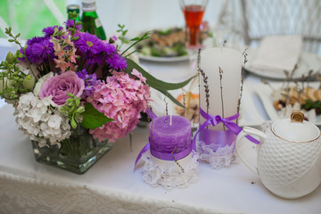 Beautiful wedding reception table arrangement, tableware and whi