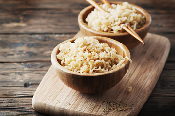 Asian fast food noodle on the wooden table