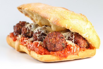 Tasty meatballs sandwich in a ciabatta with tomato sauce and parmesan