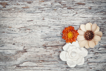 Grunge background with dry flowers on the old wood