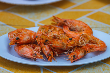 Grilled prawns on plate