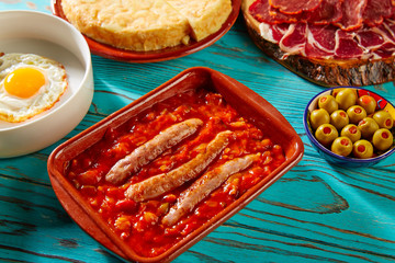 Tapas pisto con tomate ratatouille egg sausage