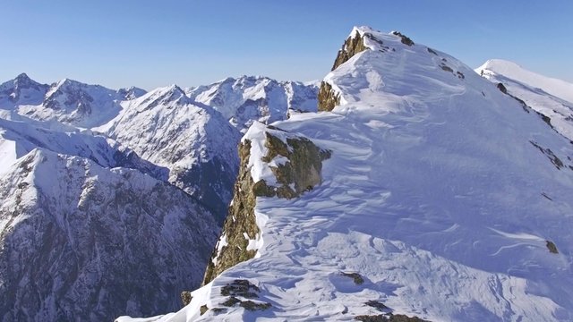 Aerial of a rocky mountain in French alps. This is a 4k video.