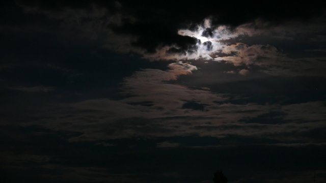 moonlit night, moon with clouds in a dark sky - timelapse 