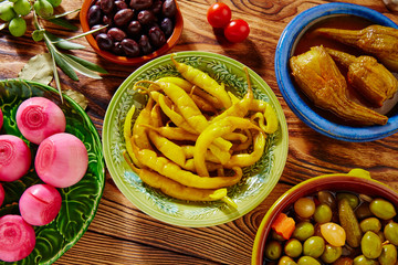 Tapas pickles mix olives chili onion eggplant